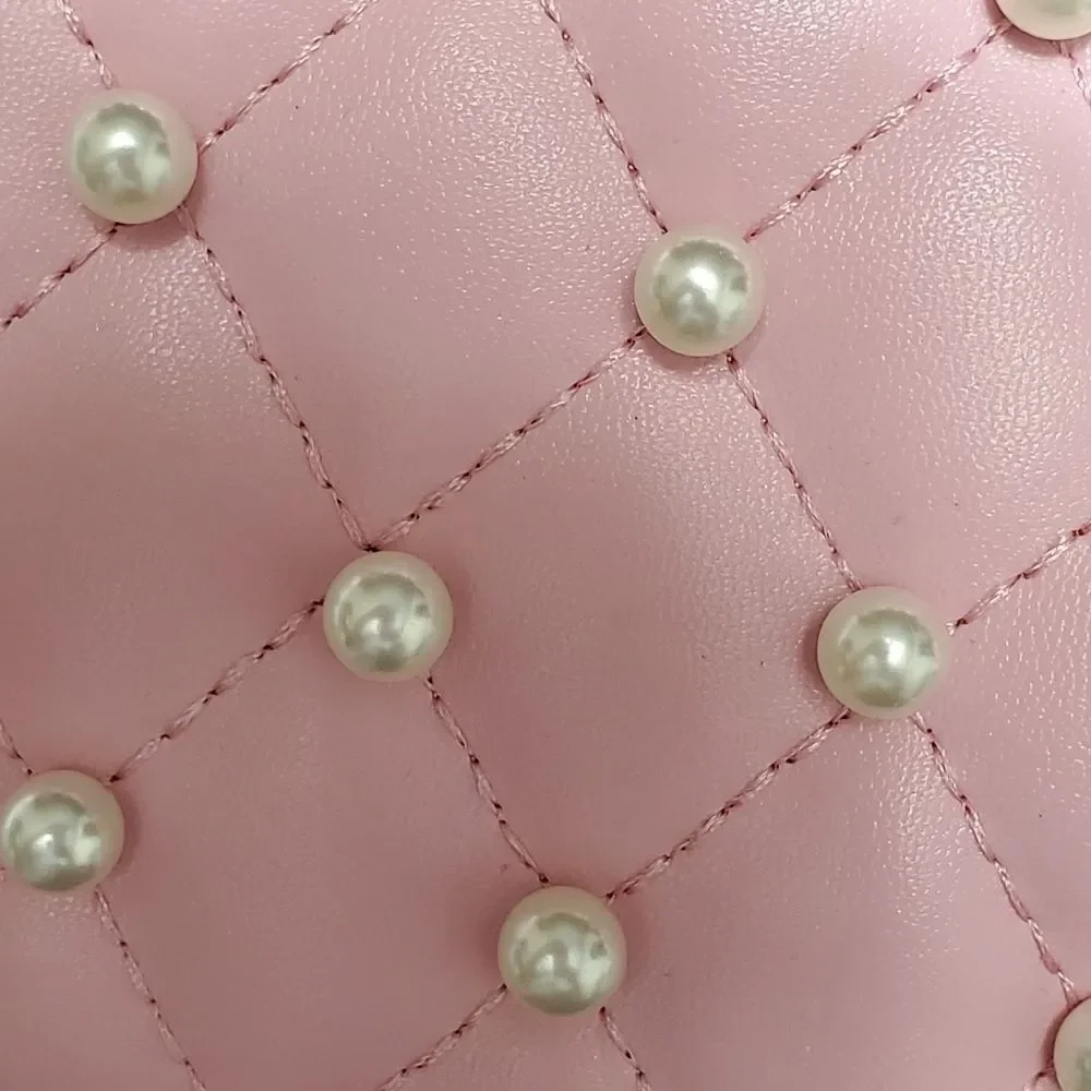 Round pink crossbody with faux pearls